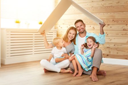 Concept,Housing,A,Young,Family.,Mother,Father,And,Children,In